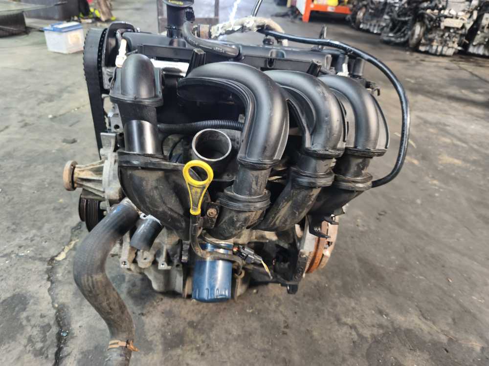 MOTEUR FORD 1.6i ESSENCE FYJA - Vue 3
